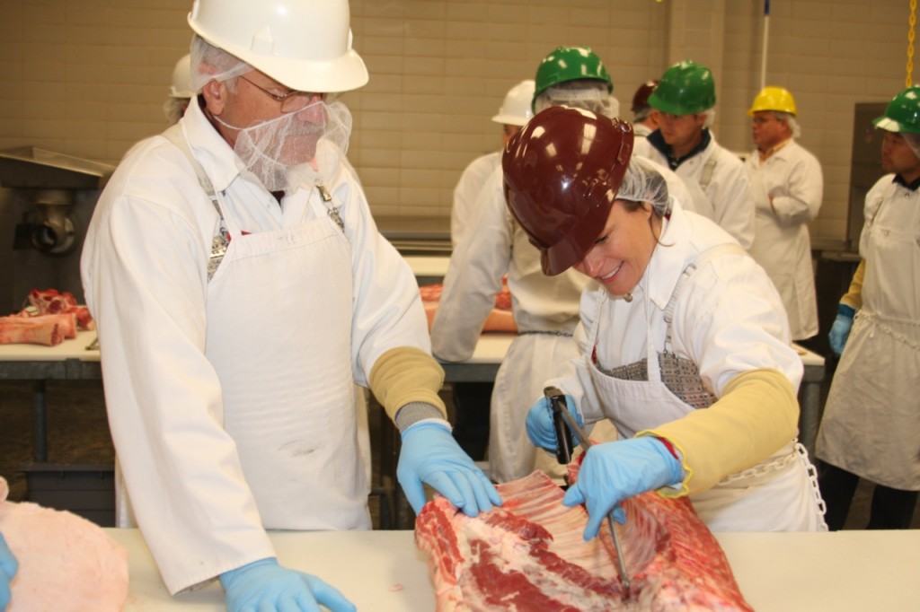 Jeff Savell instructing pork cutting
