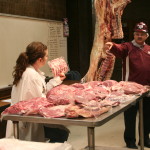 Clay Eastwood and Davey Griffin showing beef cuts