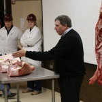 Dan Hale demonstrating pork judging