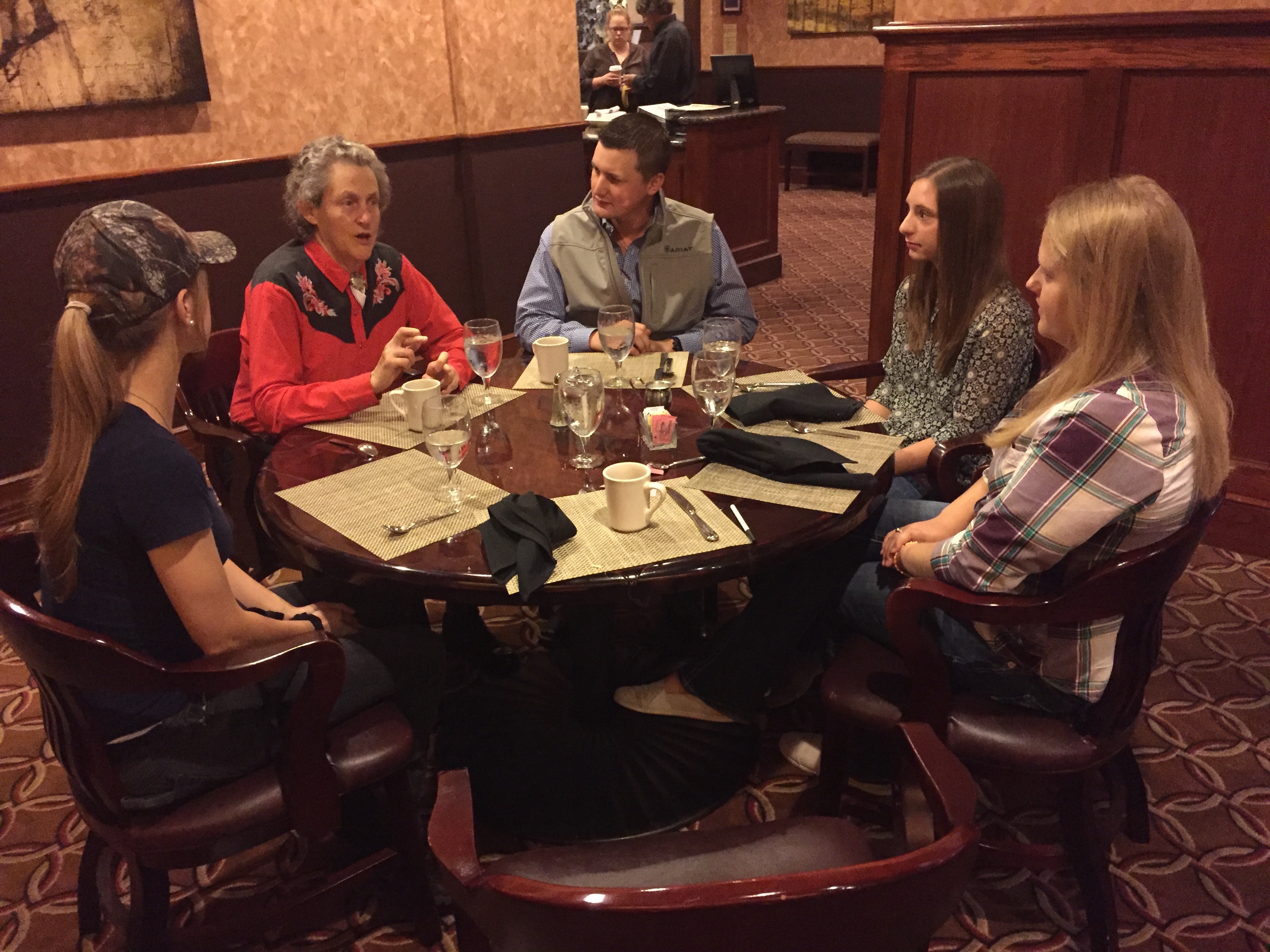 Dr. Temple Grandin having breakfast with students