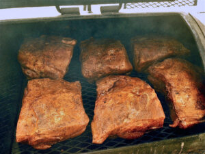 Pork Boston butts on the pit